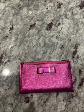 kate spade metallic fuchsia bow zip wallet